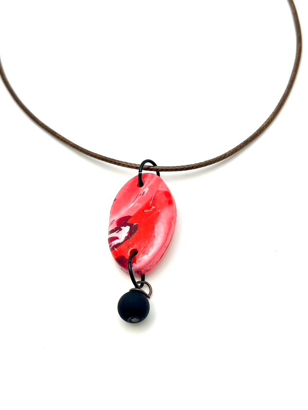 Shaded Red Oval Shaped Pendant with Black Bead